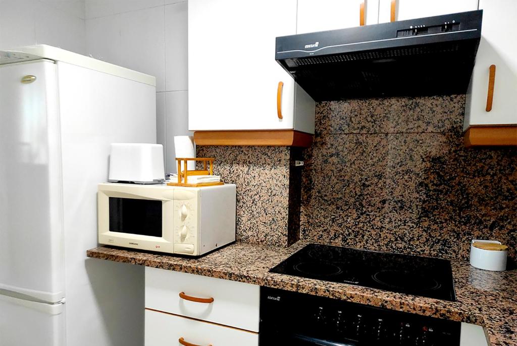 Kuchyň nebo kuchyňský kout v ubytování Apartamento Mar Peñíscola