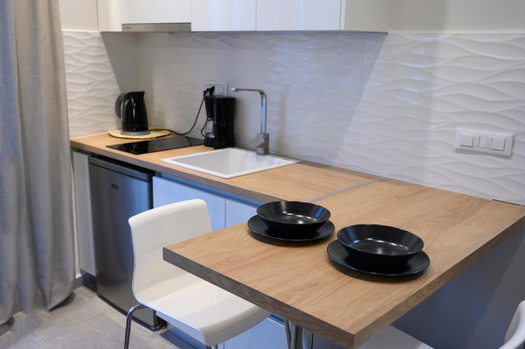 Kuchyňa alebo kuchynka v ubytovaní Luxury Suites by Panagiota