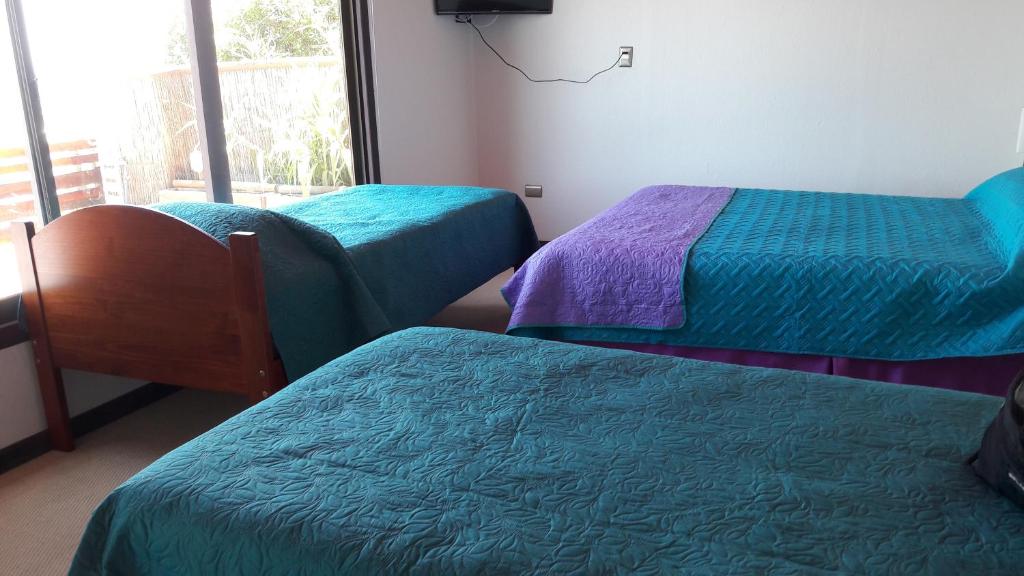 Postel nebo postele na pokoji v ubytování Hotel Terrazas Del Mar