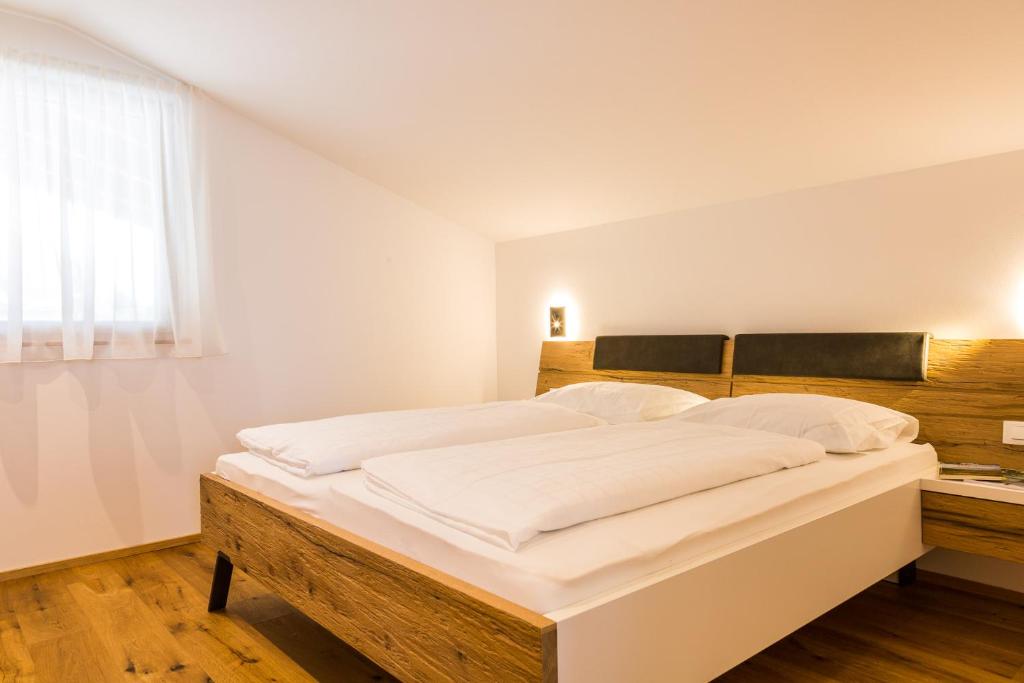 Postel nebo postele na pokoji v ubytování Innermoarhof