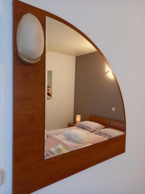 Postel nebo postele na pokoji v ubytování Apartman Katica