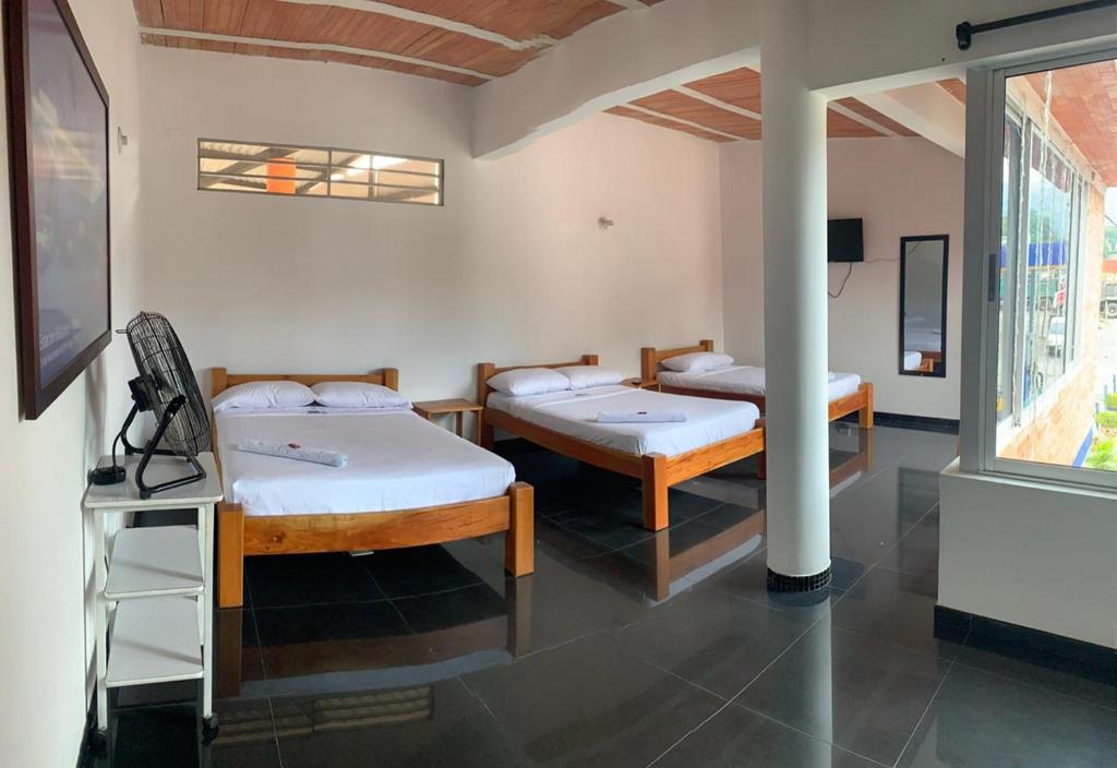 Postel nebo postele na pokoji v ubytování Hotel Bellavista Premium