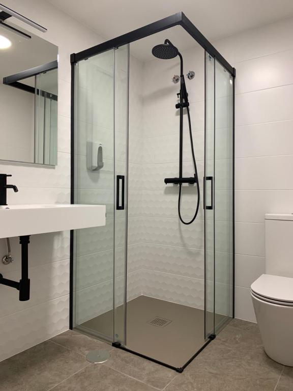 Koupelna v ubytování Hostal Comfort Suites