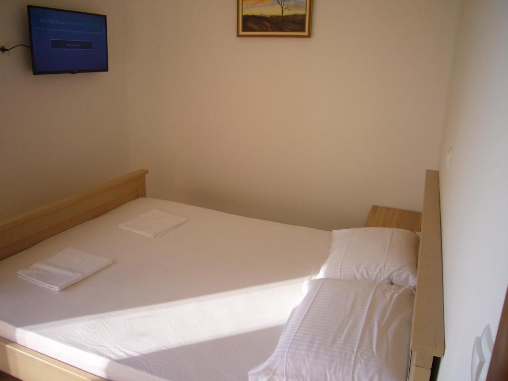 Postel nebo postele na pokoji v ubytování Villa Nadalina
