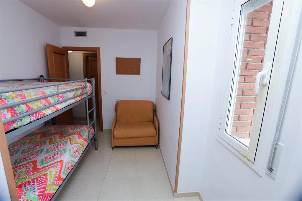 Posteľ alebo postele v izbe v ubytovaní Apartamento Plaça Jardí