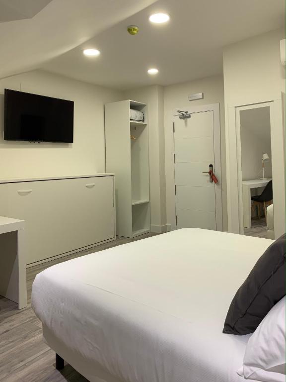 Hostal Comfort Suites - 19