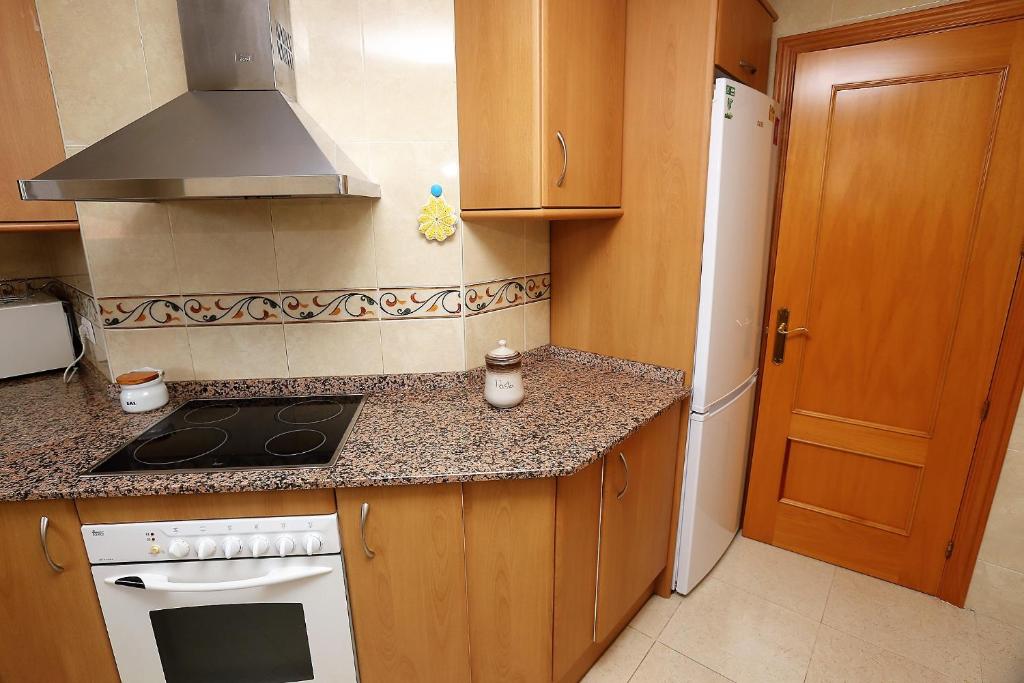 Kuchyňa alebo kuchynka v ubytovaní Apartamento Plaça Jardí