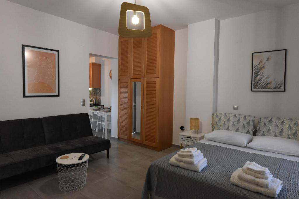 Posteľ alebo postele v izbe v ubytovaní Studio Dionysia