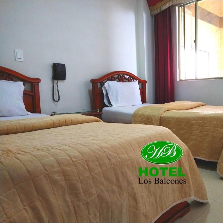 Postel nebo postele na pokoji v ubytování HOTEL LOS BALCONES