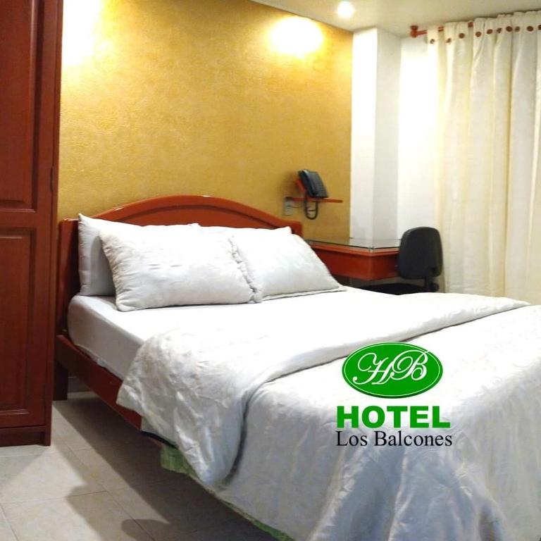 Postel nebo postele na pokoji v ubytování HOTEL LOS BALCONES