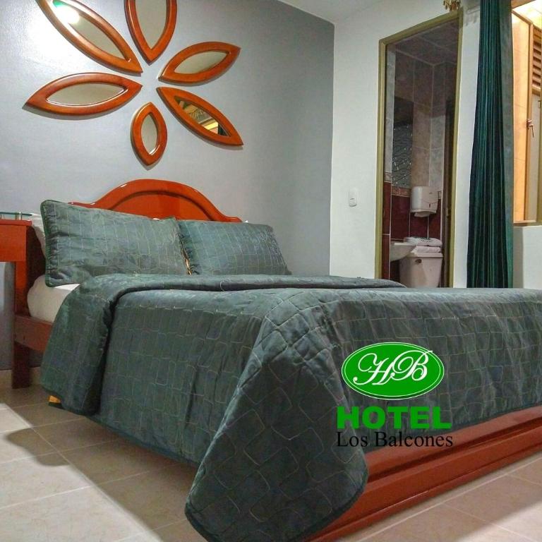 Postel nebo postele na pokoji v ubytování HOTEL LOS BALCONES