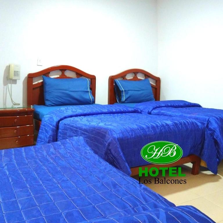 Postel nebo postele na pokoji v ubytování HOTEL LOS BALCONES