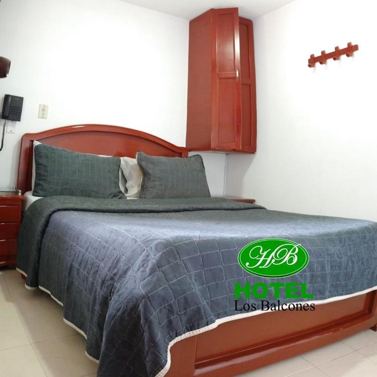 Postel nebo postele na pokoji v ubytování HOTEL LOS BALCONES