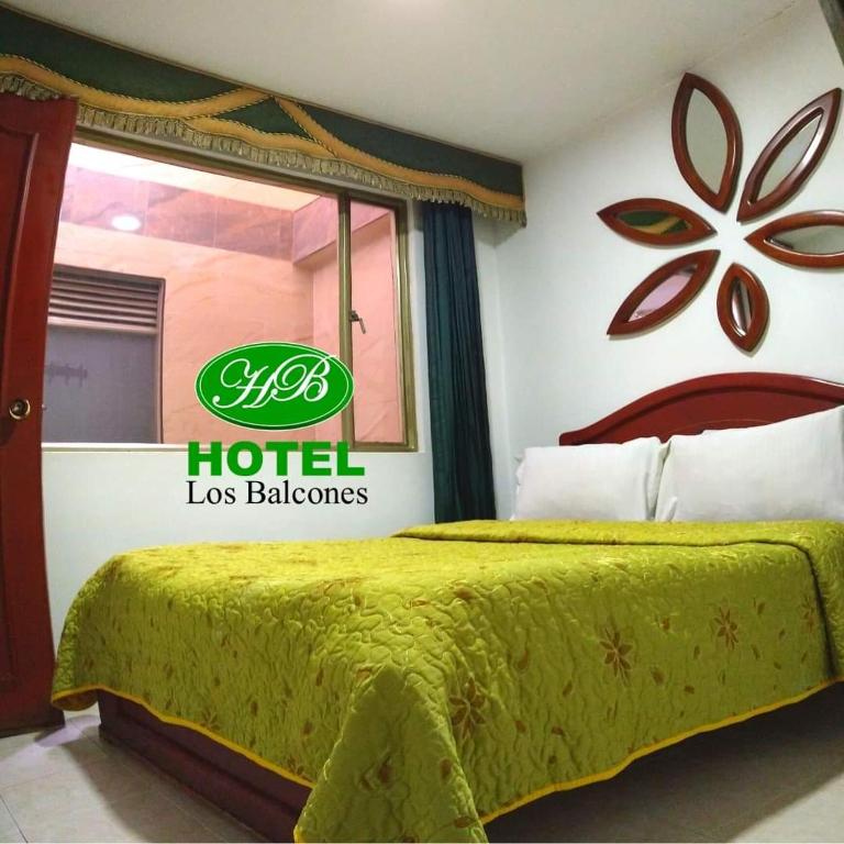 Postel nebo postele na pokoji v ubytování HOTEL LOS BALCONES
