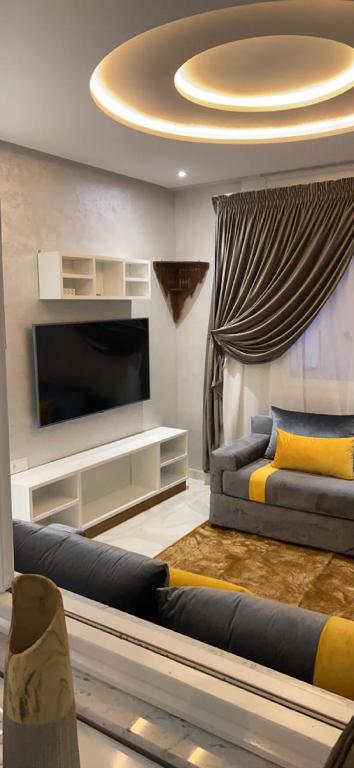 Giường trong phòng chung tại Rue Russie Appartement