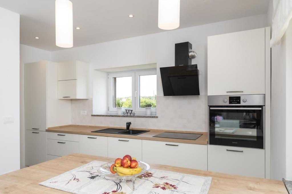 Kuchyňa alebo kuchynka v ubytovaní Apartment Roma