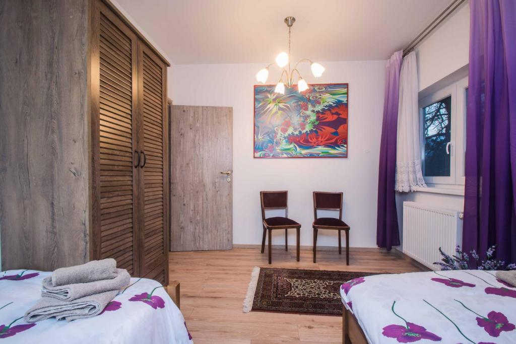 Postel nebo postele na pokoji v ubytování Apartman Jozefina