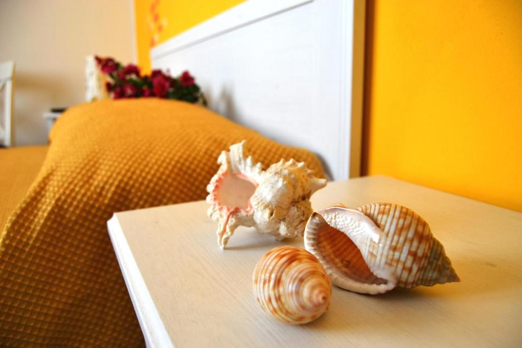 Posteľ alebo postele v izbe v ubytovaní B&B Vivere il Mare