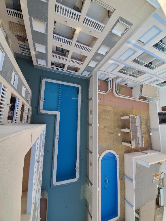 Fotografie z fotogalerie ubytování Appartement proche plage avec piscine en centre ville v destinaci Torrevieja