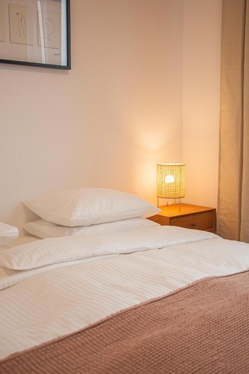 Posteľ alebo postele v izbe v ubytovaní Przytulny Apartament Mickiewicza 14 4