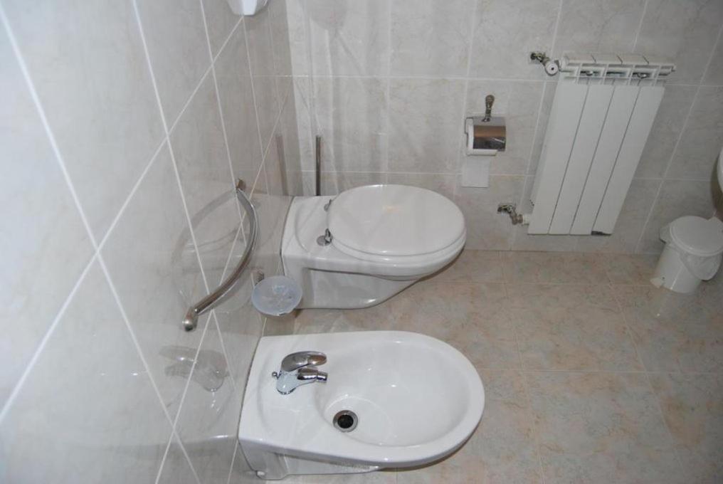 Koupelna v ubytování Hotel Il Chierichetto