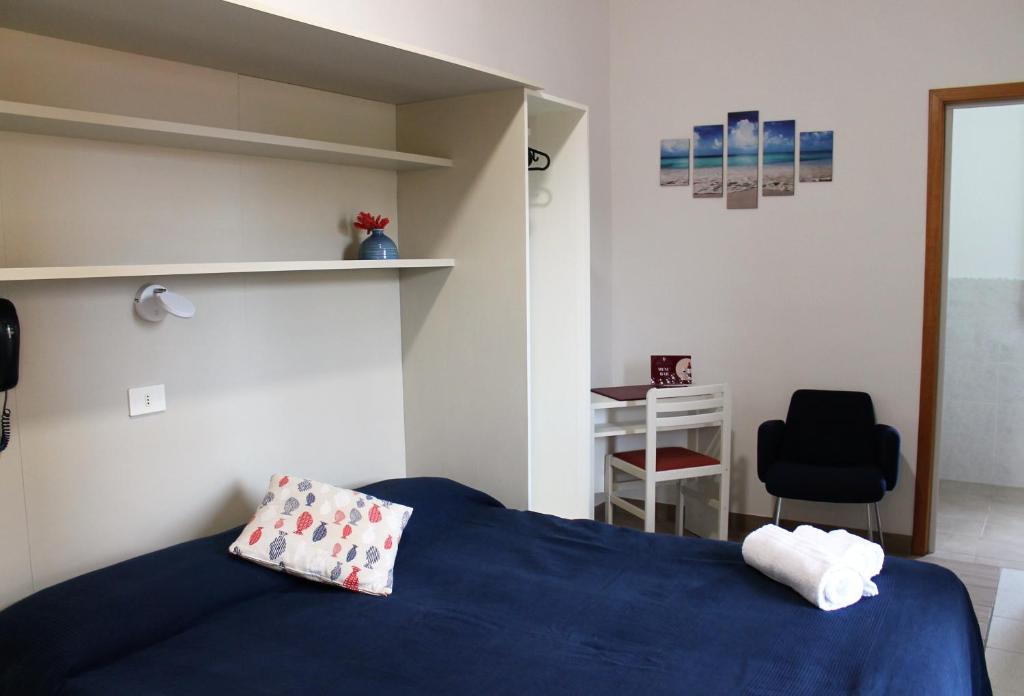 Postel nebo postele na pokoji v ubytování Hotel Villa Susy