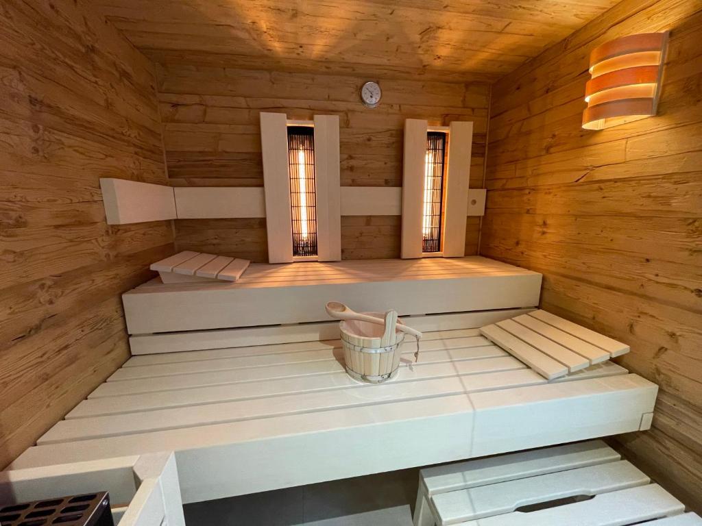 Postel nebo postele na pokoji v ubytování Alpenchalet Iseler