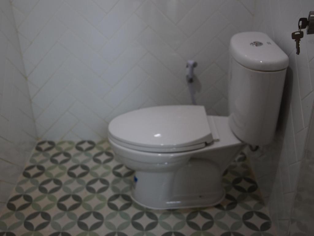 Koupelna v ubytování GSV Cottage Sharia