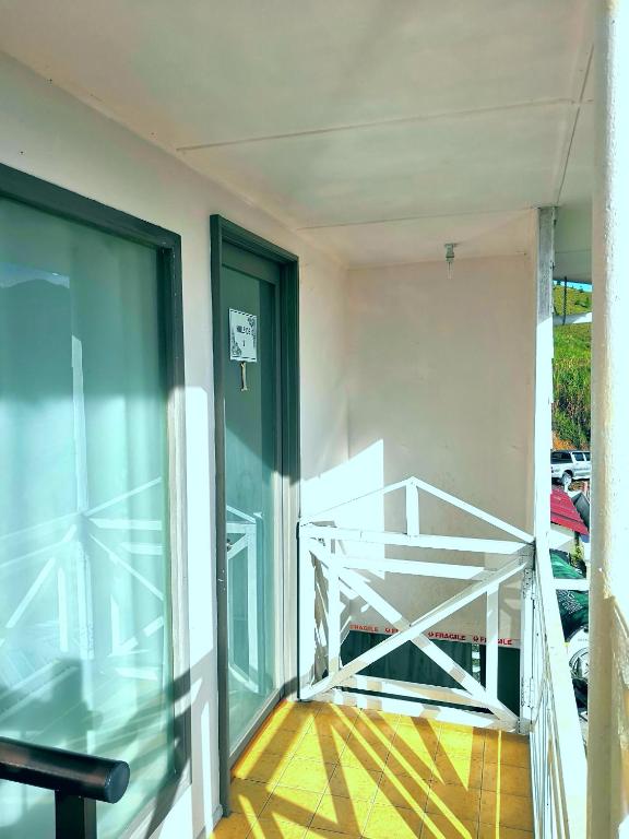 Balkón nebo terasa v ubytování D' Limbai Cottage
