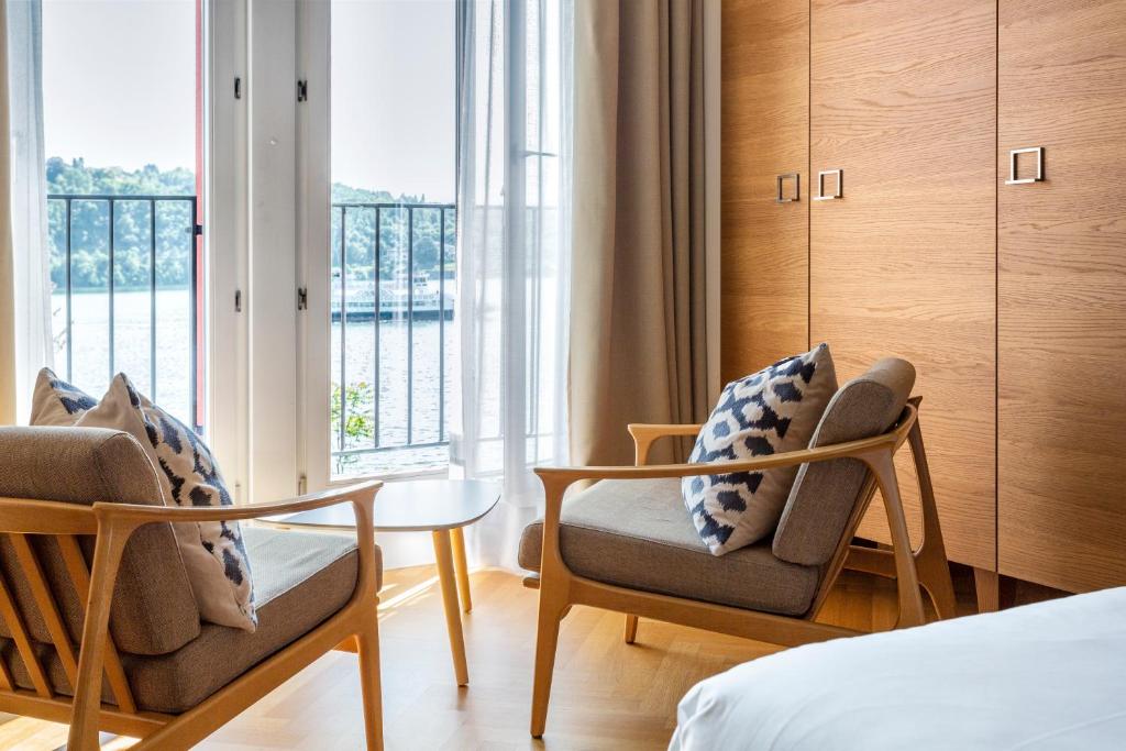 Posezení v ubytování Hotel de Charme Laveno - Luxury all Inclusive