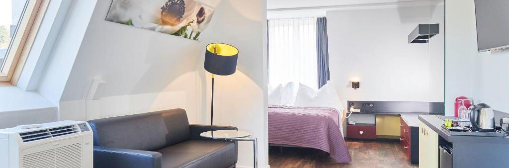 Kuchyň nebo kuchyňský kout v ubytování Hotel Hottingen
