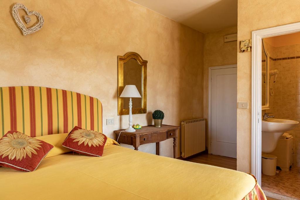 Postel nebo postele na pokoji v ubytování Agriturismo Percenna