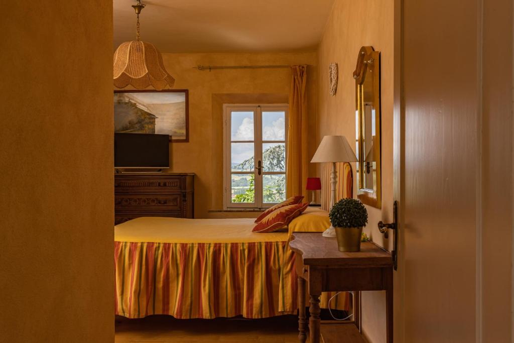 Postel nebo postele na pokoji v ubytování Agriturismo Percenna