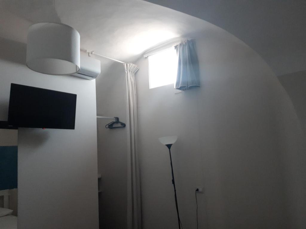 Televízia a/alebo spoločenská miestnosť v ubytovaní I 3 Principi, Paolo