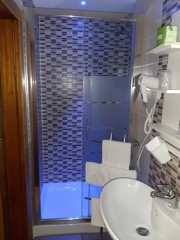 Koupelna v ubytování Hotel Victoria