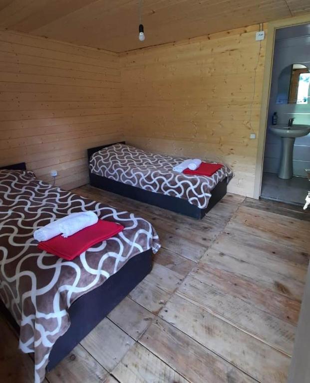 Postel nebo postele na pokoji v ubytování Guesthouse Pirimze
