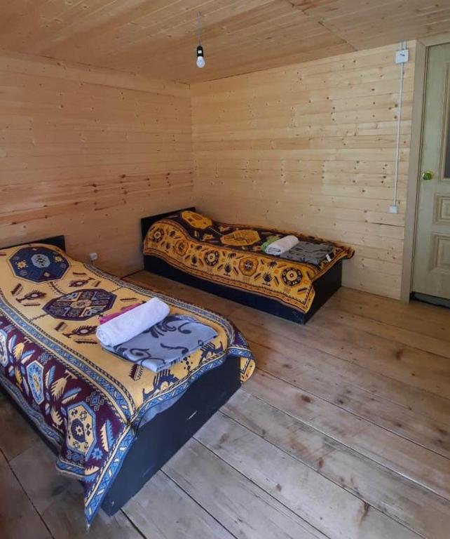 Postel nebo postele na pokoji v ubytování Guesthouse Pirimze