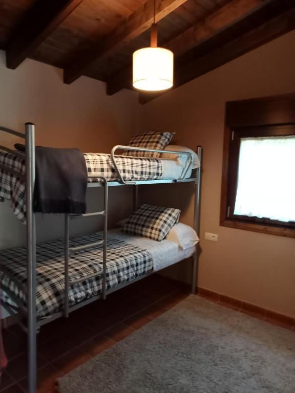 Postel nebo postele na pokoji v ubytování Finca O Loureiro