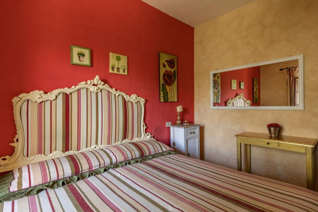 Postel nebo postele na pokoji v ubytování Agriturismo Percenna