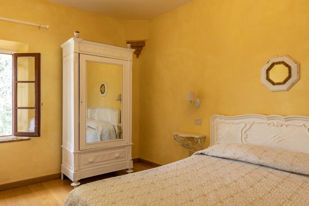 Postel nebo postele na pokoji v ubytování Agriturismo Percenna
