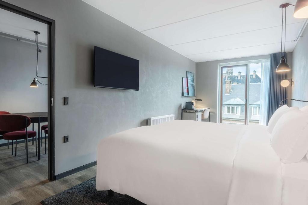 Krevet ili kreveti u jedinici u okviru objekta Radisson RED Aarhus