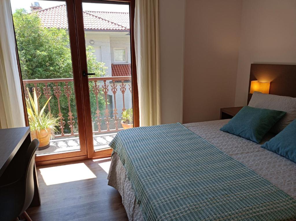 Posteľ alebo postele v izbe v ubytovaní Albergue Hostel Nuestra Señora del Camino