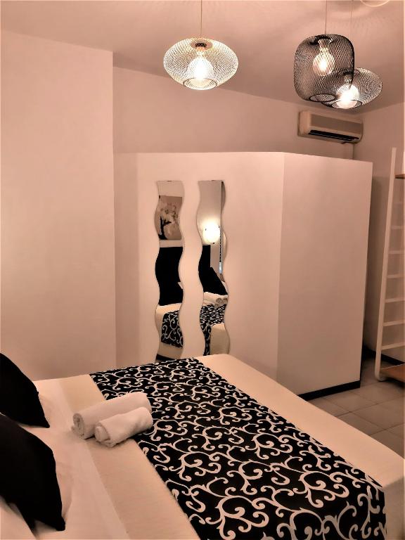 Postel nebo postele na pokoji v ubytování Hotel Victoria