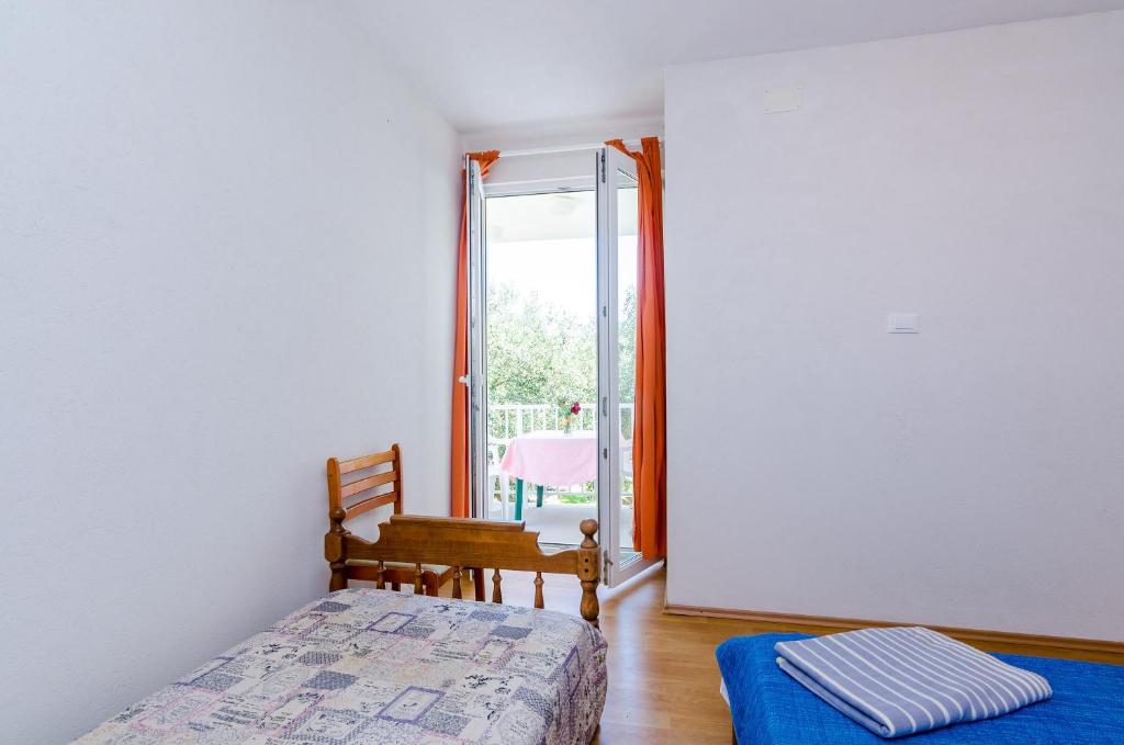 Posteľ alebo postele v izbe v ubytovaní Apartments Glavor