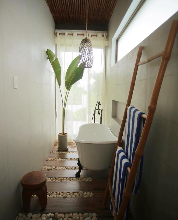 Koupelna v ubytování Ahana Resort El Nido