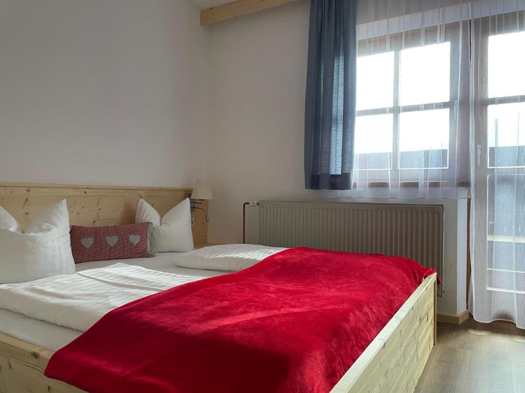 Postel nebo postele na pokoji v ubytování Hotel Berghof