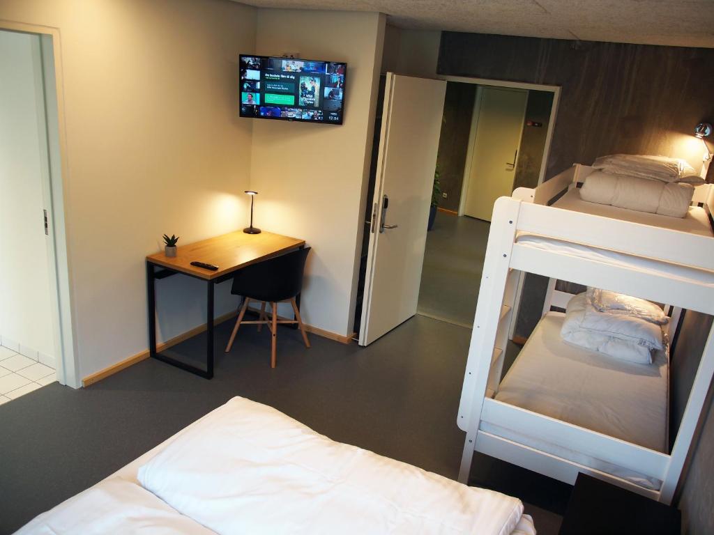 Postel nebo postele na pokoji v ubytování DBU Hotel & Kursuscenter