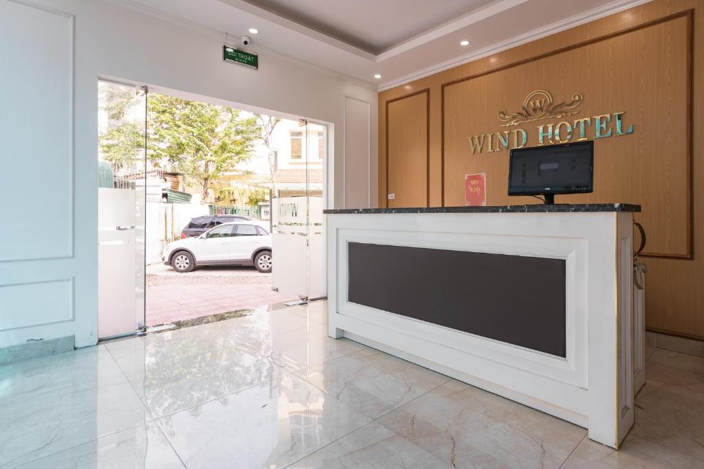 TV a/nebo společenská místnost v ubytování Wind Hotel