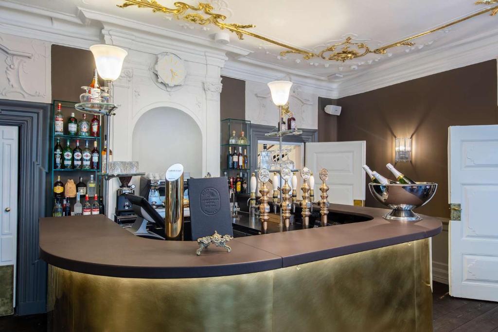 Lounge nebo bar v ubytování Jørgensens Hotel