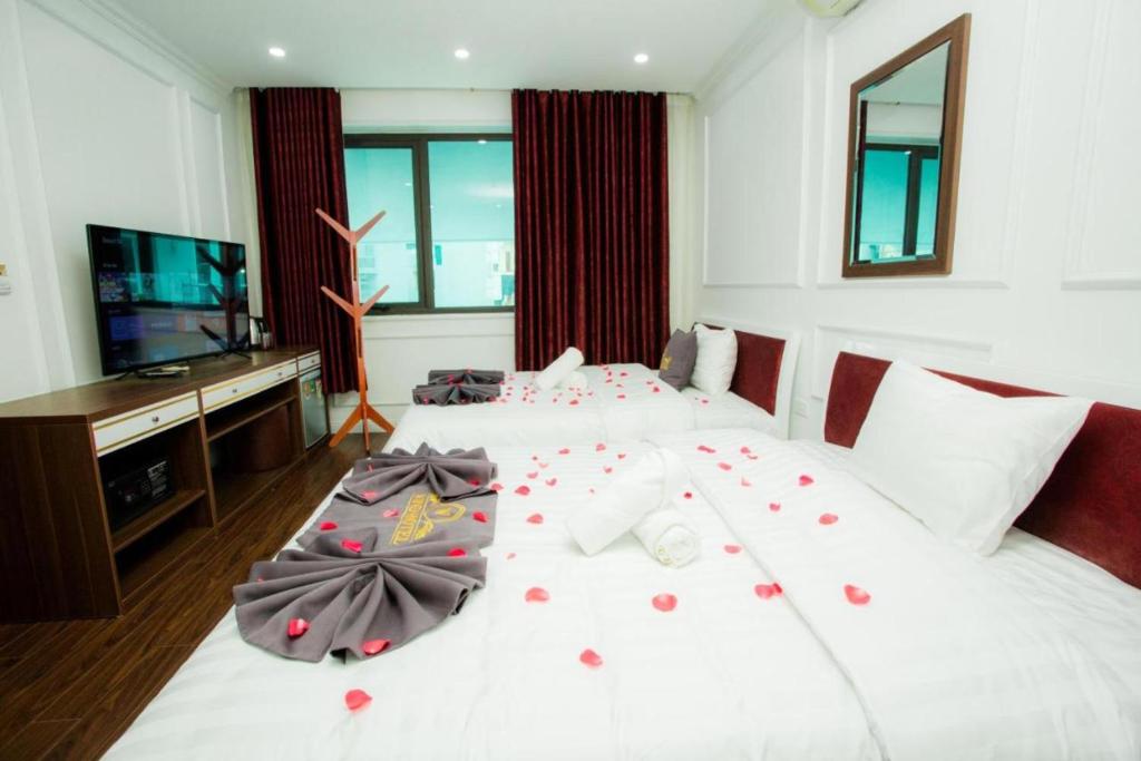 Postel nebo postele na pokoji v ubytování Wind Hotel